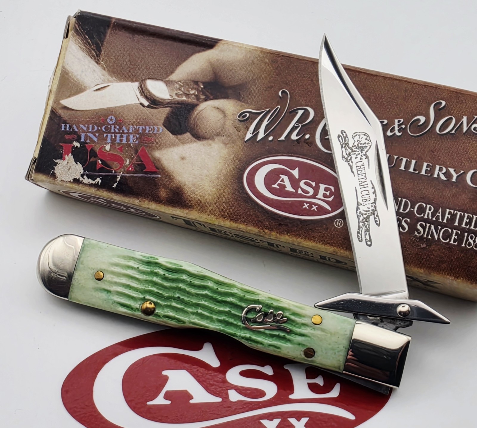 2009 Case XX Emerald Green Bone Silverscript Cheerah Cub