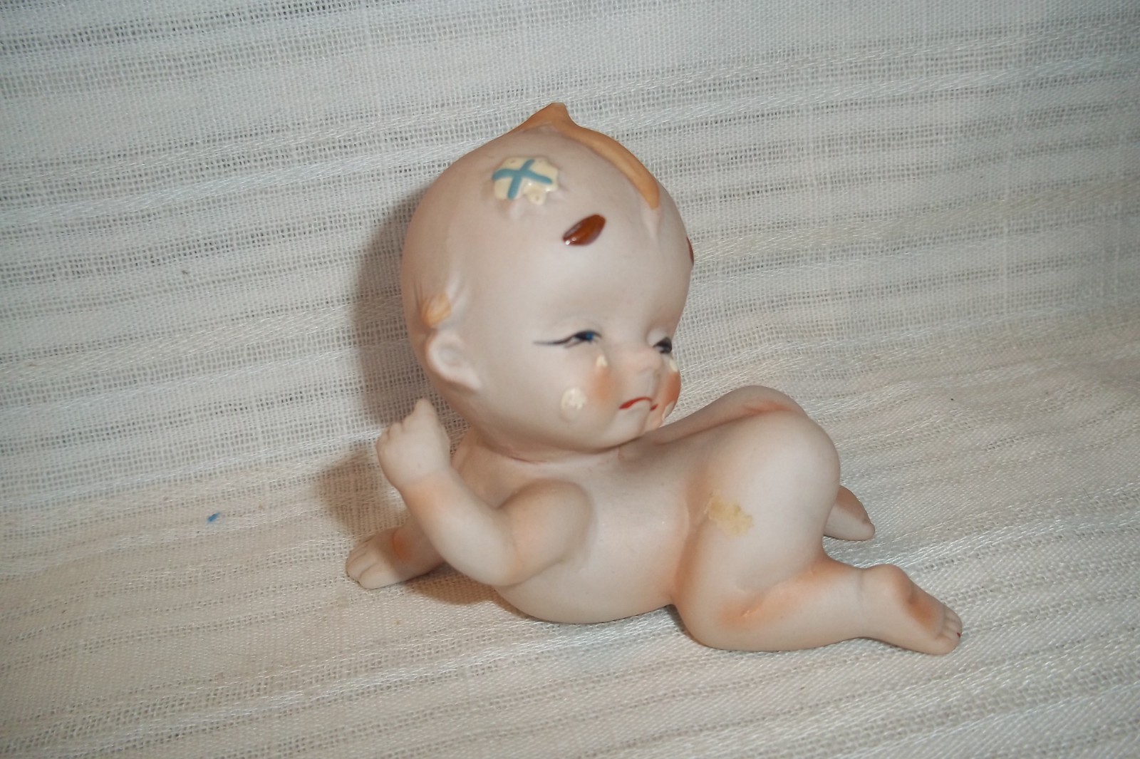 VINTAGE CRYING BABY/ KEWPIE FIGURINE
