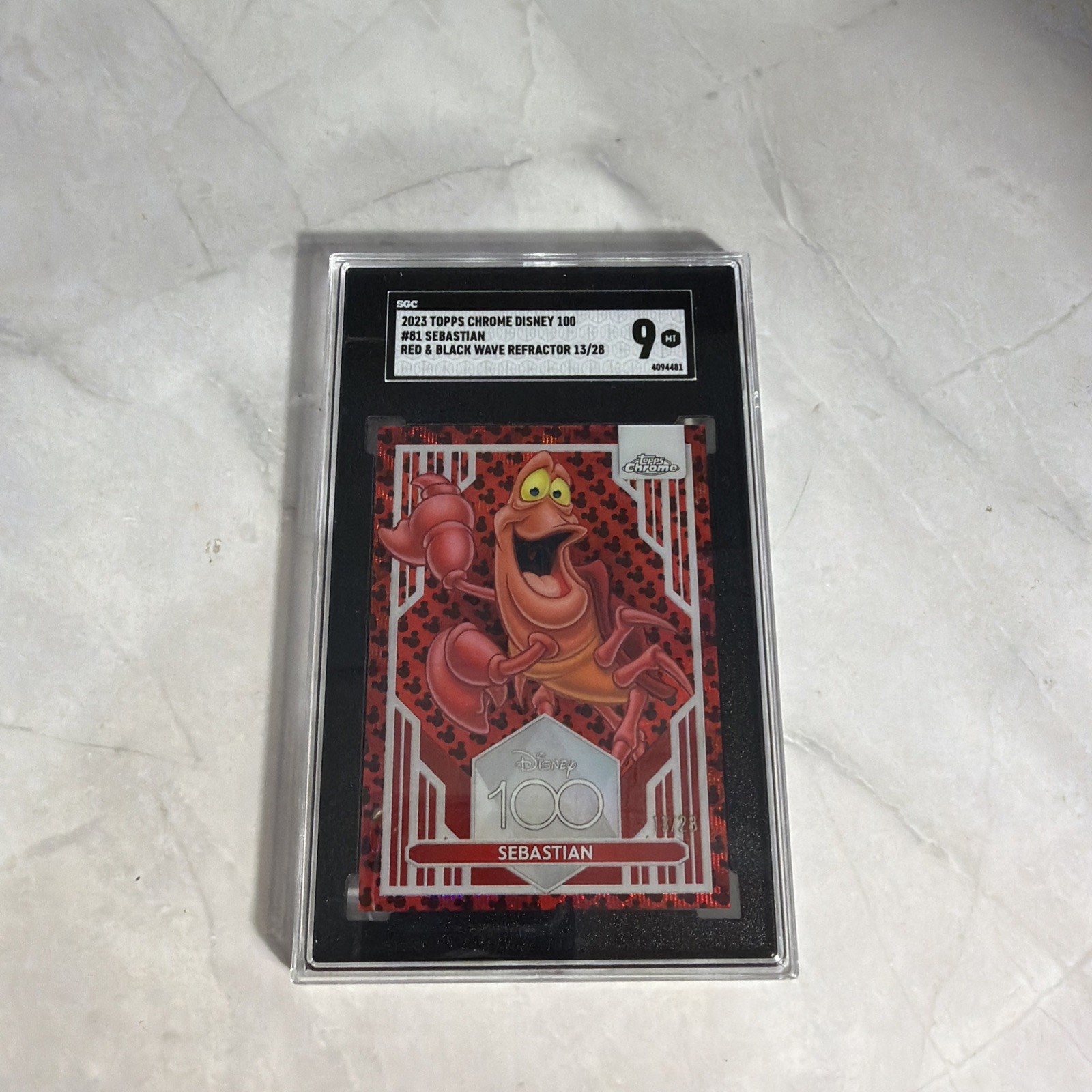 2023 Topps Chrome Disney 100 Sebastian Red & Black Wave Refractor #/28 SGC 9