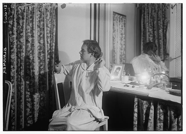 Photo:Sidney Alderman Blackmer Seated at Mirror Dressing Room 1920s