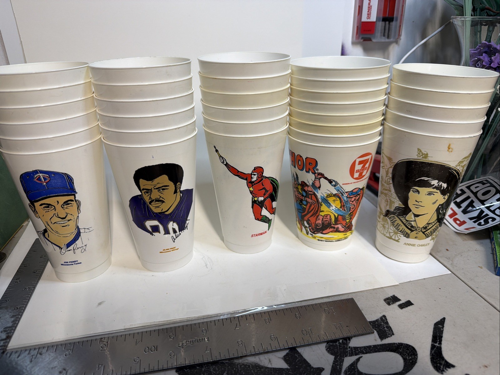 Lot of 31 7-Eleven Slurpee Cups from 1970s Comics, Sports, Western Look