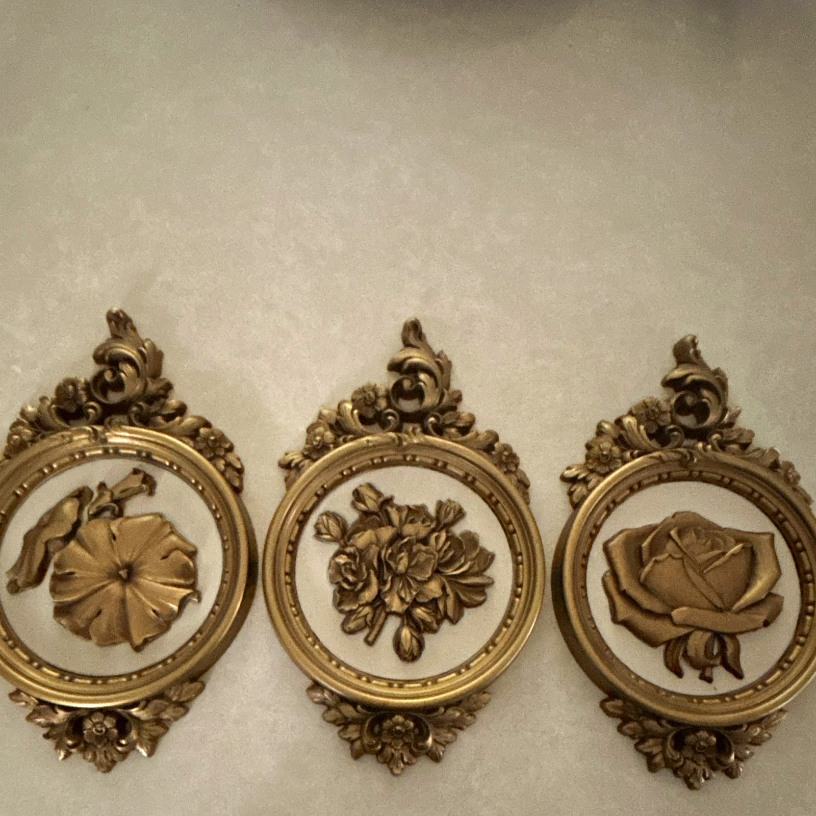 1970’s Hollywood Regency wall plaque - set of three. Gold 8x14 inches