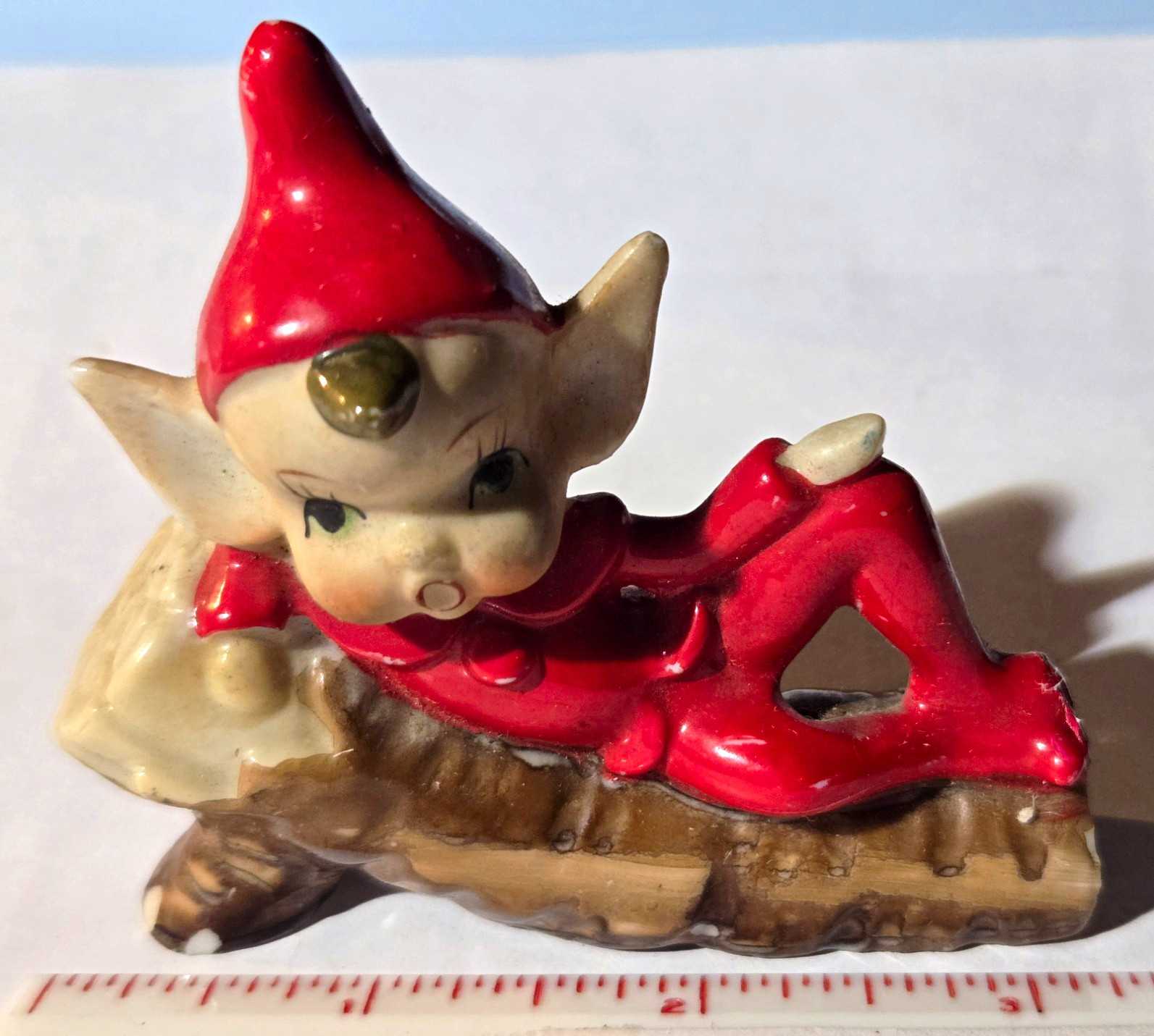 Vintage Ceramic Elf Figurine Reclining on Log, Red Outfit, Marked Japan
