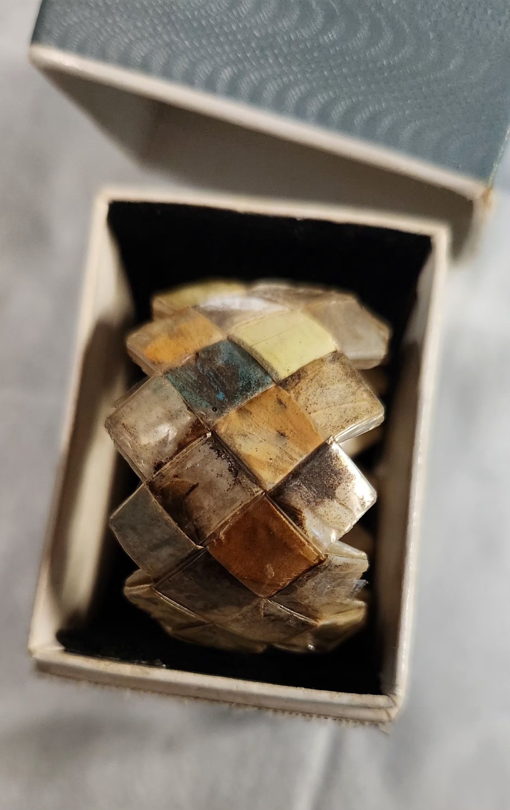 Rare WWII trench art napkin ring (c. 1943–45)  woven with butterfly wing pieces