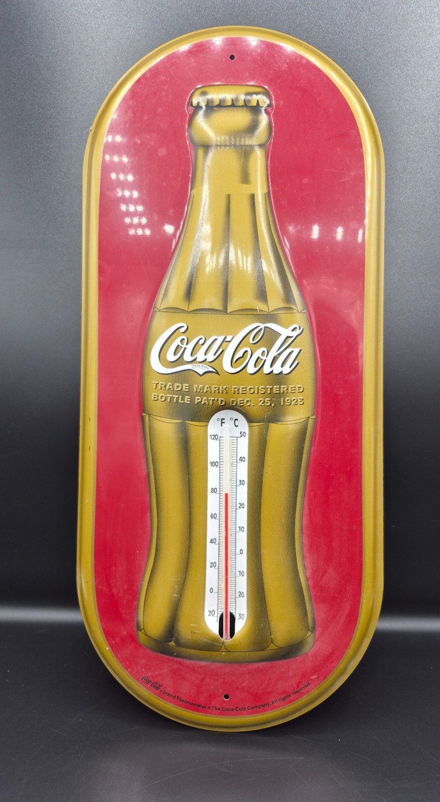 Vintage red and gold coca cola thermometer sign