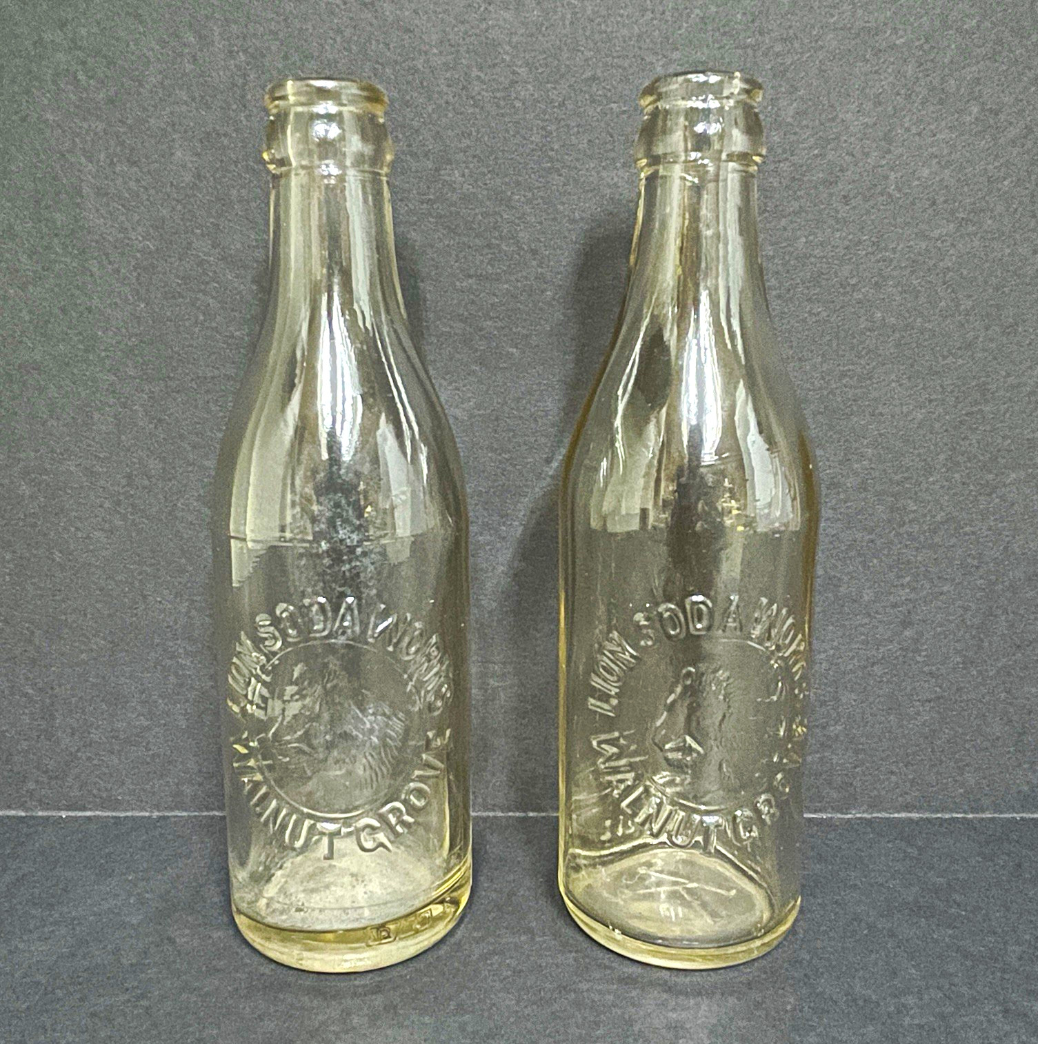 Pair Vintage Lion Soda Works Walnut Grove Clear Glass Bottles California