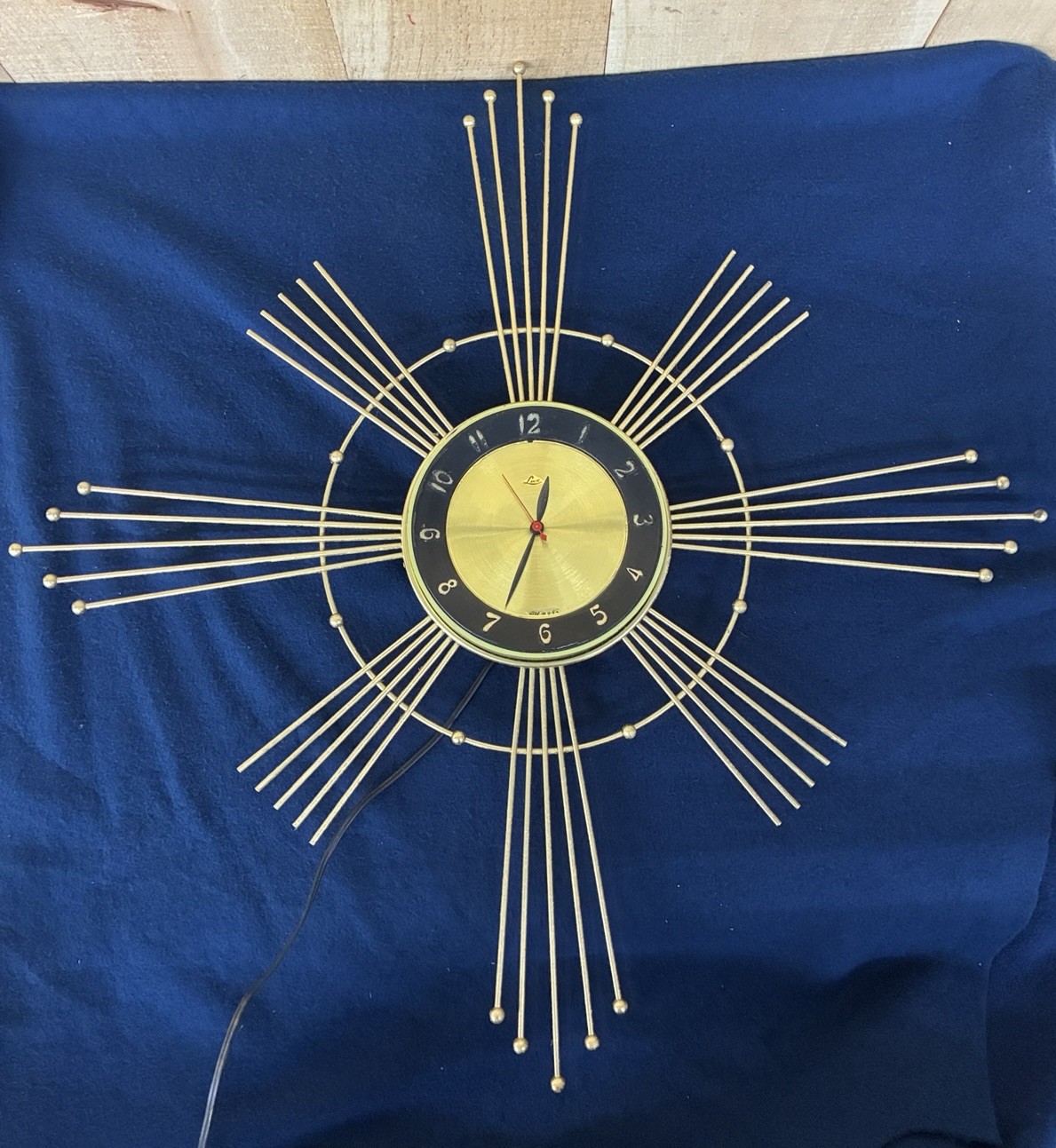 Vintage Mid Century Modern Electric Wall Clock Made by Luxe Starburst Gold-tone