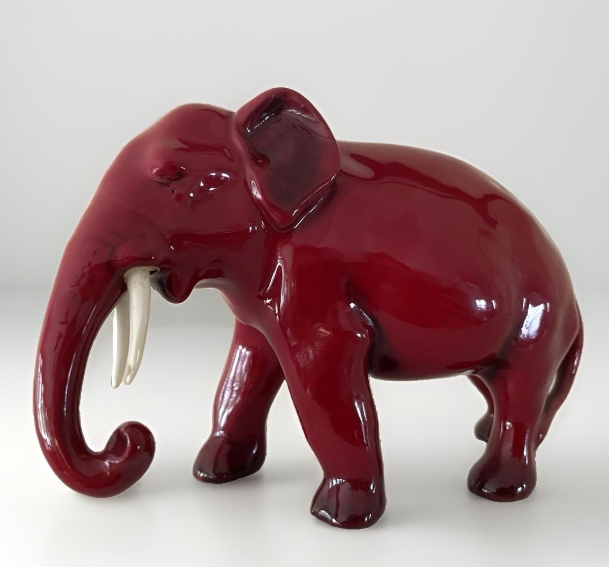 Rare Atq Royal Doulton Flambe Elephant Trunk Down W/ Ivory Tusks figurine EUC Rare Atq Royal Doulton Flambe Elephant Trunk Down W/ Ivory Tusks figurine EUC