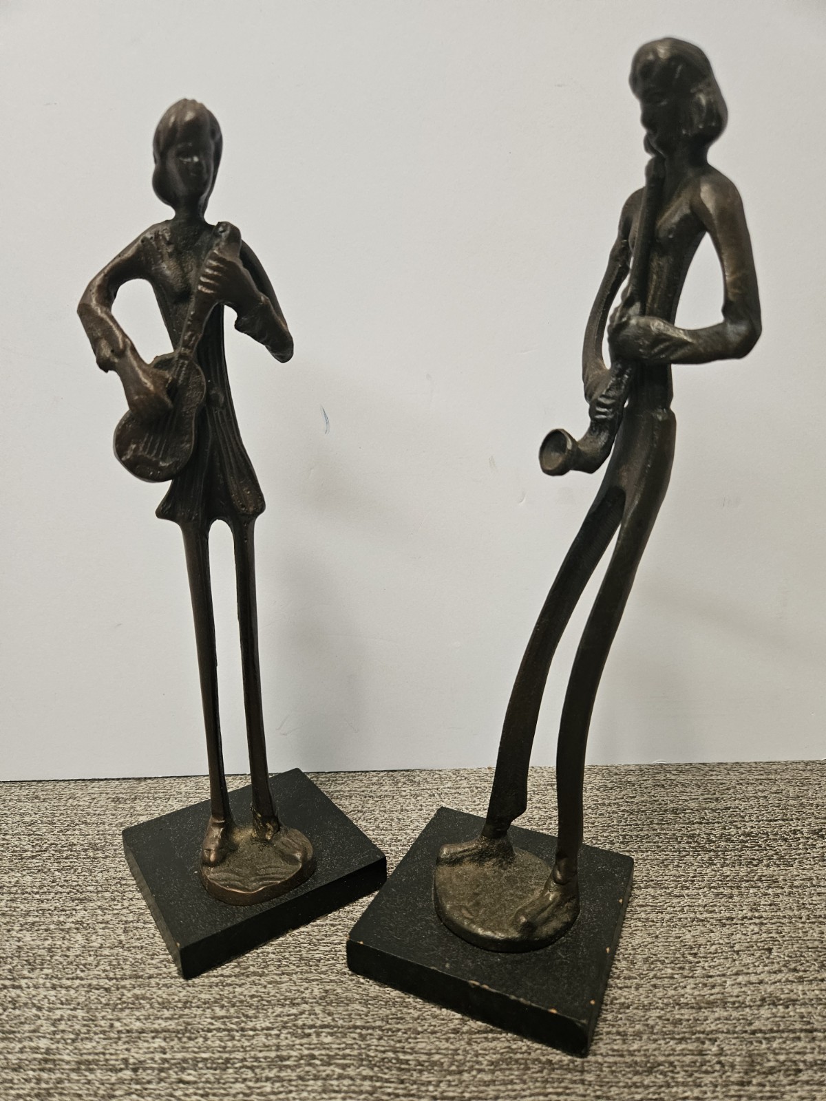 Vtg two Painted Solid Brass Musicians: Guitarist and Saxophonist.