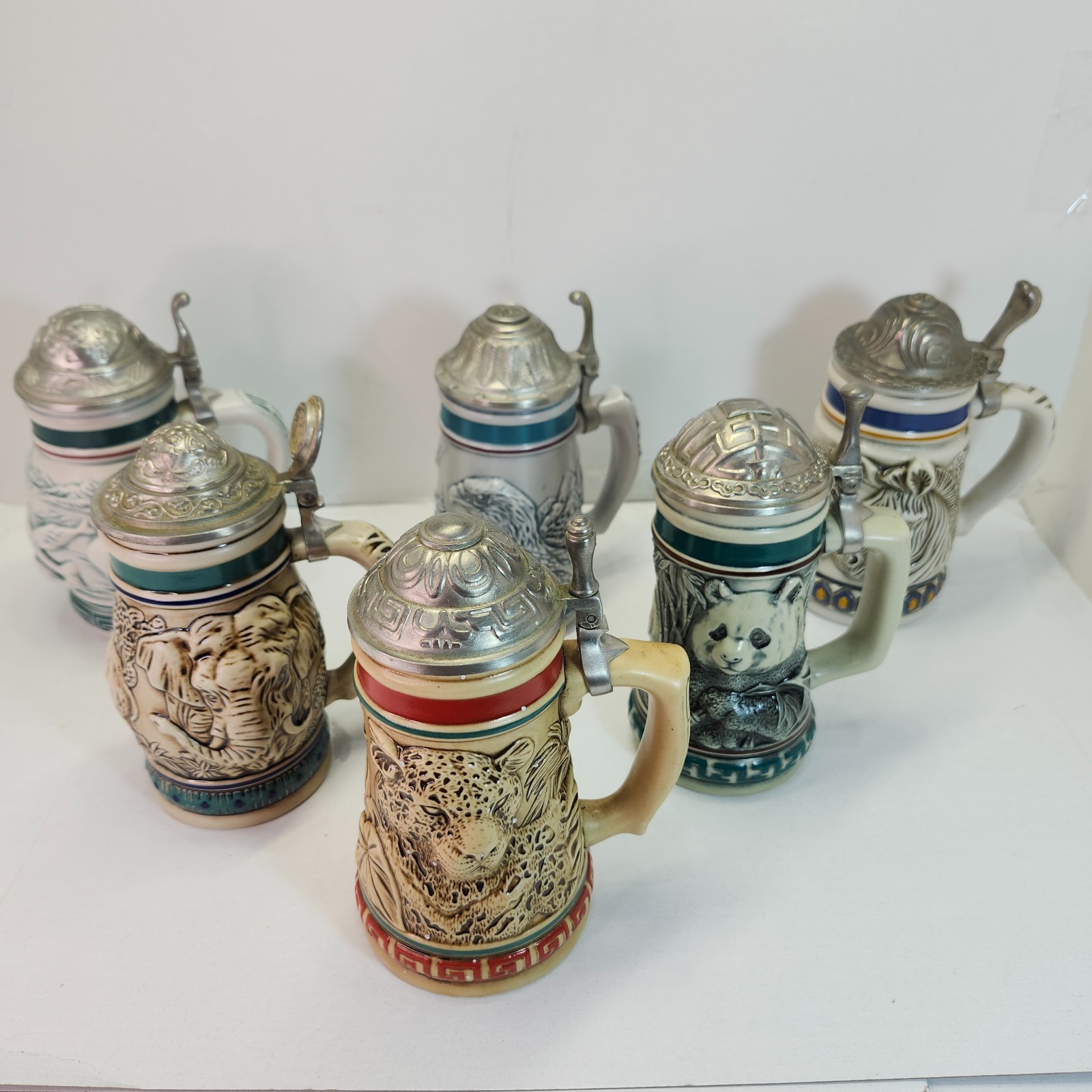Avon Endangered Species Mini Stein Set of 6 w/ Lids Elephant Panda Whale & More Avon Endangered Species Mini Stein Set of 6 w/ Lids Elephant Panda Whale & More