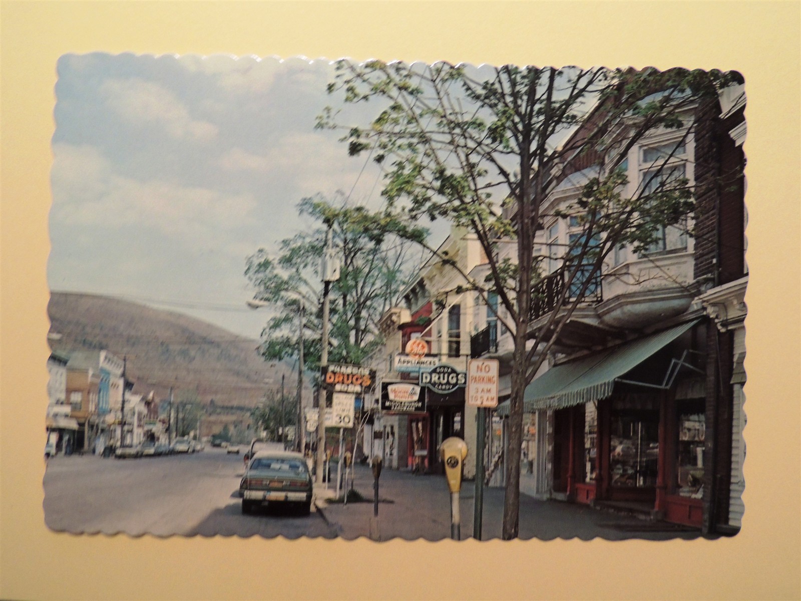 Middleburgh New York vintage postcard street view in business district 1970\'s