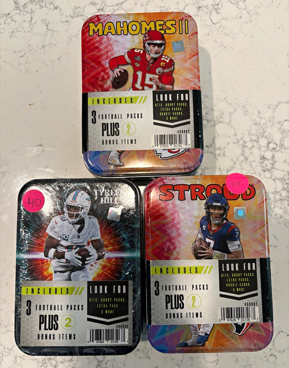NFL 2024 Advertising Tin Lot of 3: Mahomes II, Tyreek Hill, C.J. Stroud NFL 2024 Advertising Tin Lot of 3: Mahomes II, Tyreek Hill, C.J. Stroud