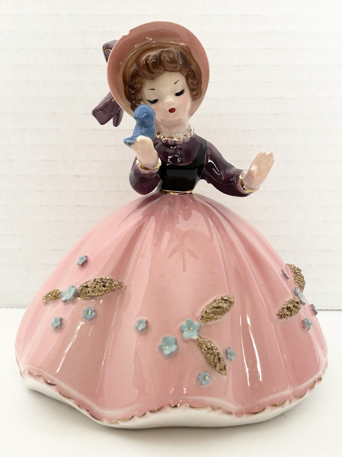 Josef Originals Little Pet Series Girl Pink Dress Holding Blue Bird Chip On Hat