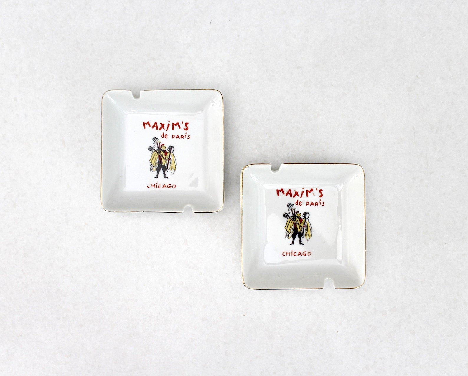 2 Maxim's de Paris Chicago Ceramic Ashtrays Mid Century Gold Trim 1960s 2 Maxim's de Paris Chicago Ceramic Ashtrays Mid Century Gold Trim 1960s