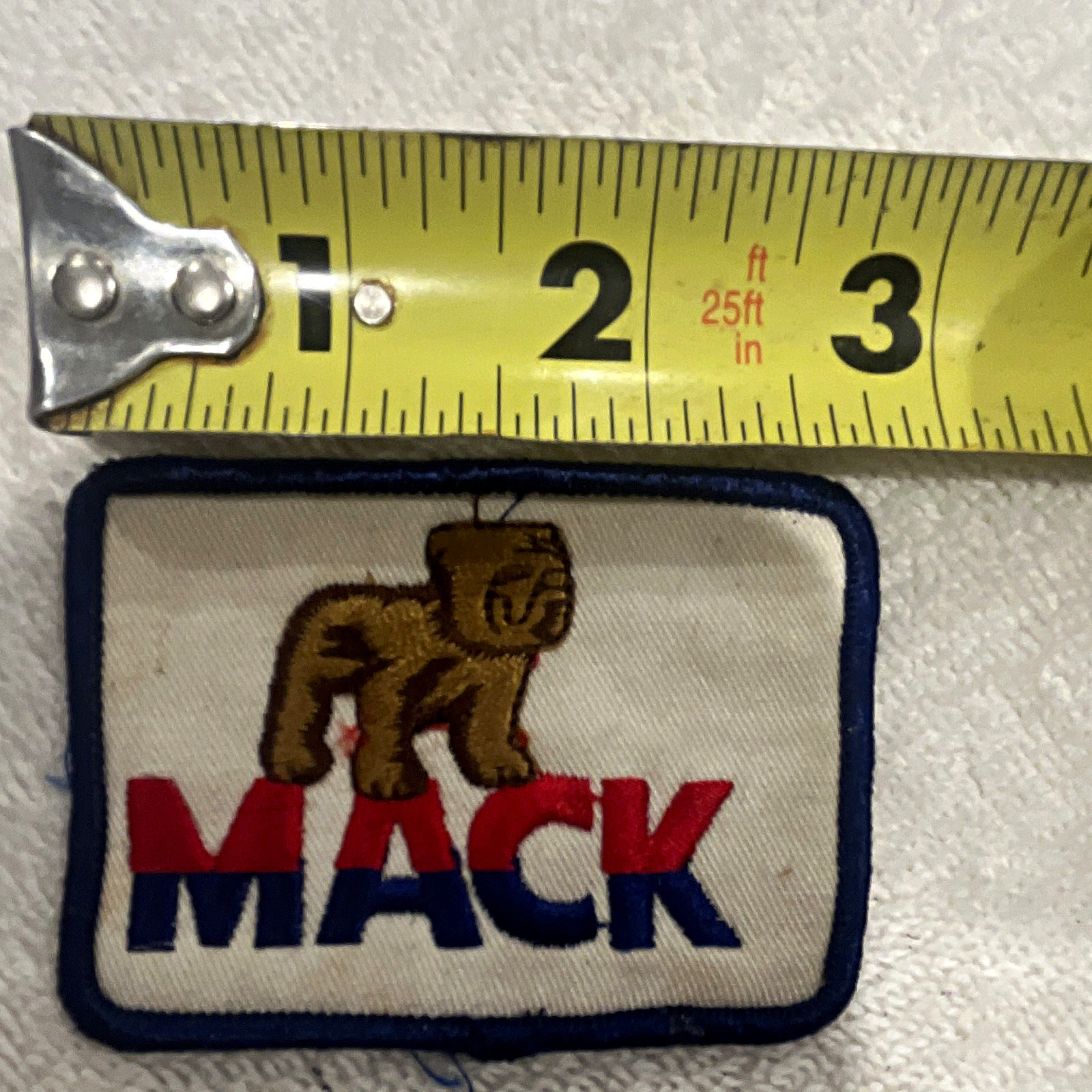 Mack Trucks Bulldog Logo Embroidered Patch - Blue Border - Approx 3 x 2 in Mack Trucks Bulldog Logo Embroidered Patch - Blue Border - Approx 3 x 2 in