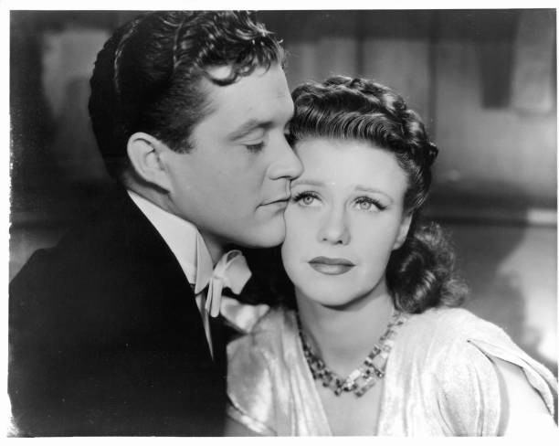 Dennis Morgan leaning into Ginger Rogers a scene film Kitty Foyle - Old Photo