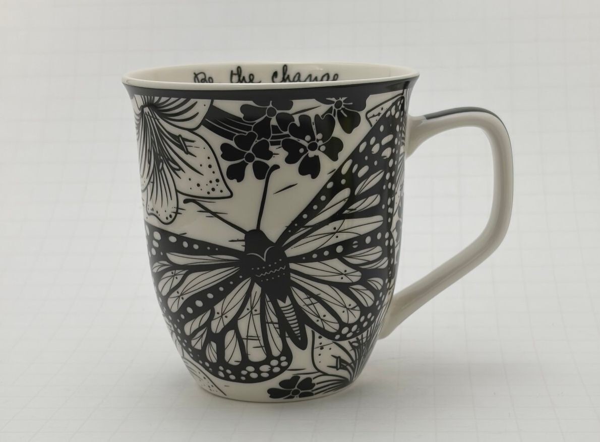 Karma Black and White Butterfly Ceramic Mug with \'Be the Change\' Inscription