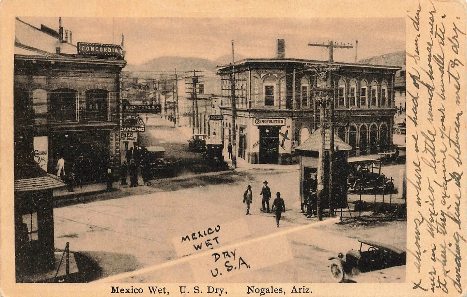 1923 ARIZONA PHOTO POSTCARD: DANCE BUILDINGS ON MEX. SIDE, U.S. DRY, NOGALES, AZ