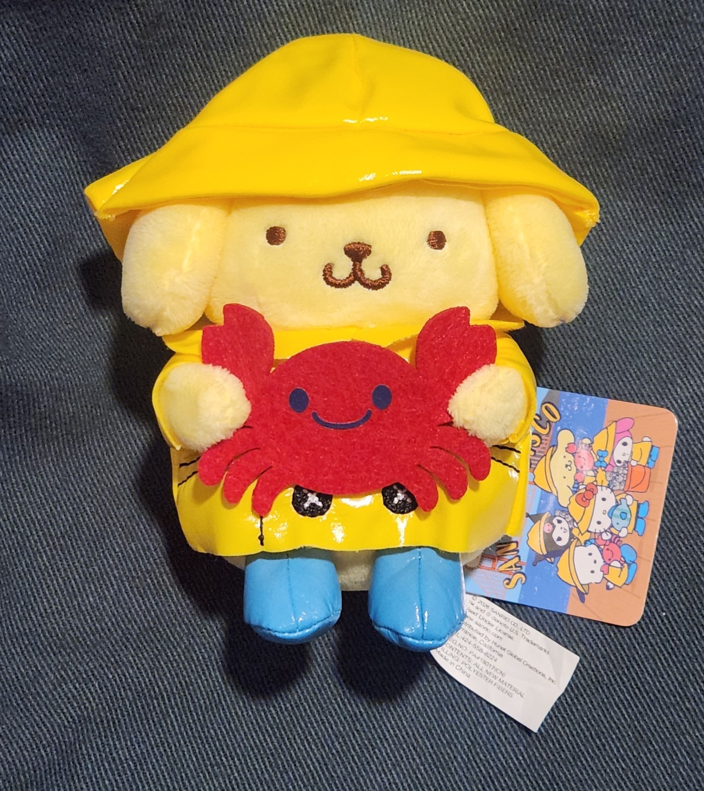 Sanrio Pompompurin Kinokuniya Fisherman Raincoat San Francisco Keychain Plush 