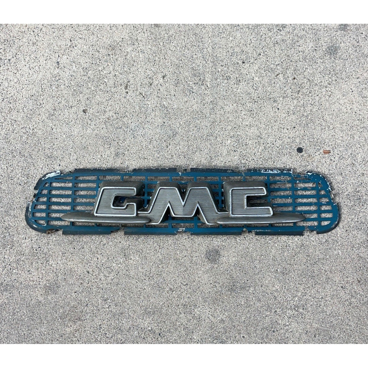 vintage 1955-1956 GMC Truck hood emblem with its original grille insert panel vintage 1955-1956 GMC Truck hood emblem with its original grille insert panel