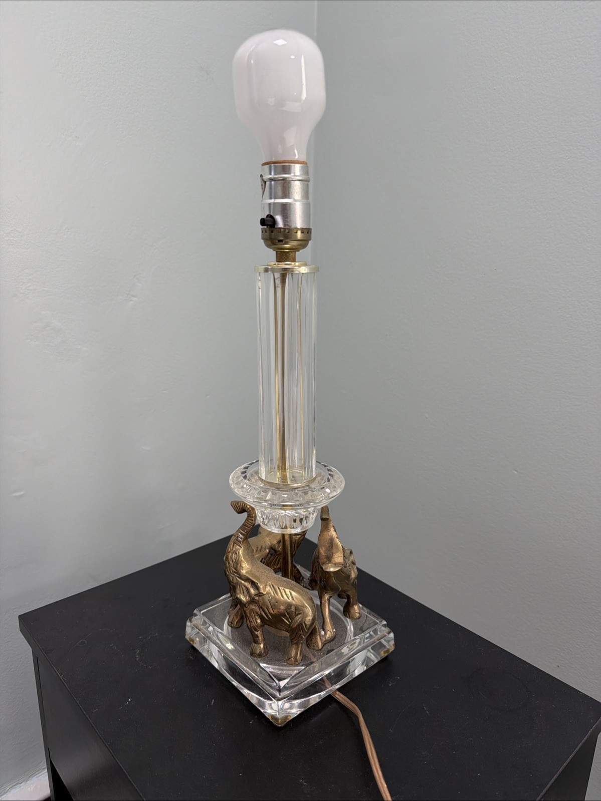 Vintage 1970s crystal and brass table lamp. Cluster of brass elephants Base Vintage 1970s crystal and brass table lamp. Cluster of brass elephants Base