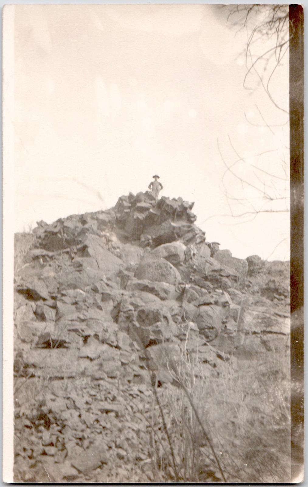 c1909 Man Standing Atop Rocky Outcrop RPPC Postcard Scenic Outdoor View