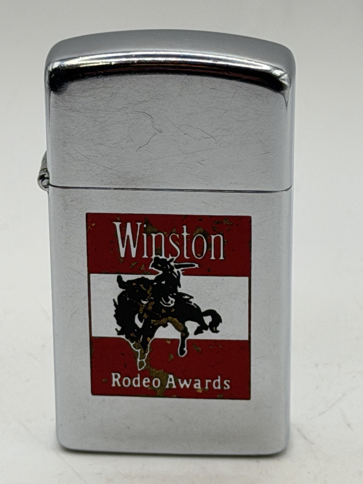 Winston Rodeo Awards Bull Rider Vintage 1972 HP Chrome Slim Zippo Lighter Winston Rodeo Awards Bull Rider Vintage 1972 HP Chrome Slim Zippo Lighter