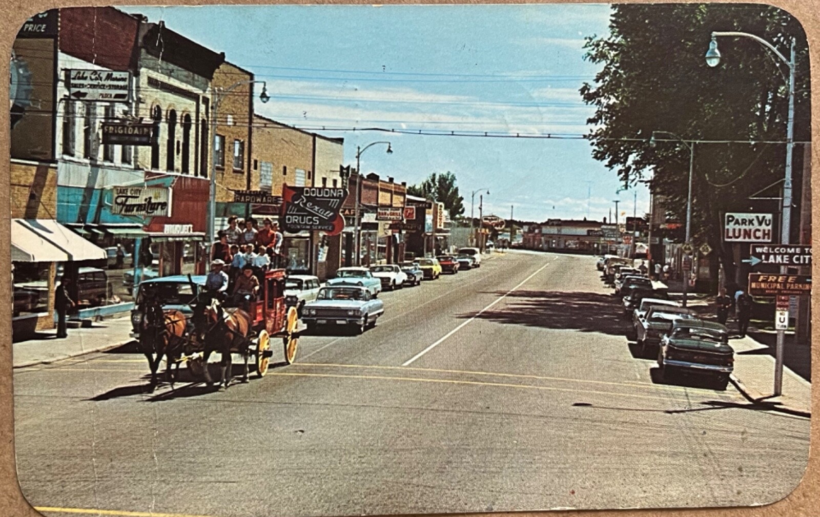 Lake City Michigan Main Street Stage Coach Rexall Drugs Postcard c1970 Lake City Michigan Main Street Stage Coach Rexall Drugs Postcard c1970