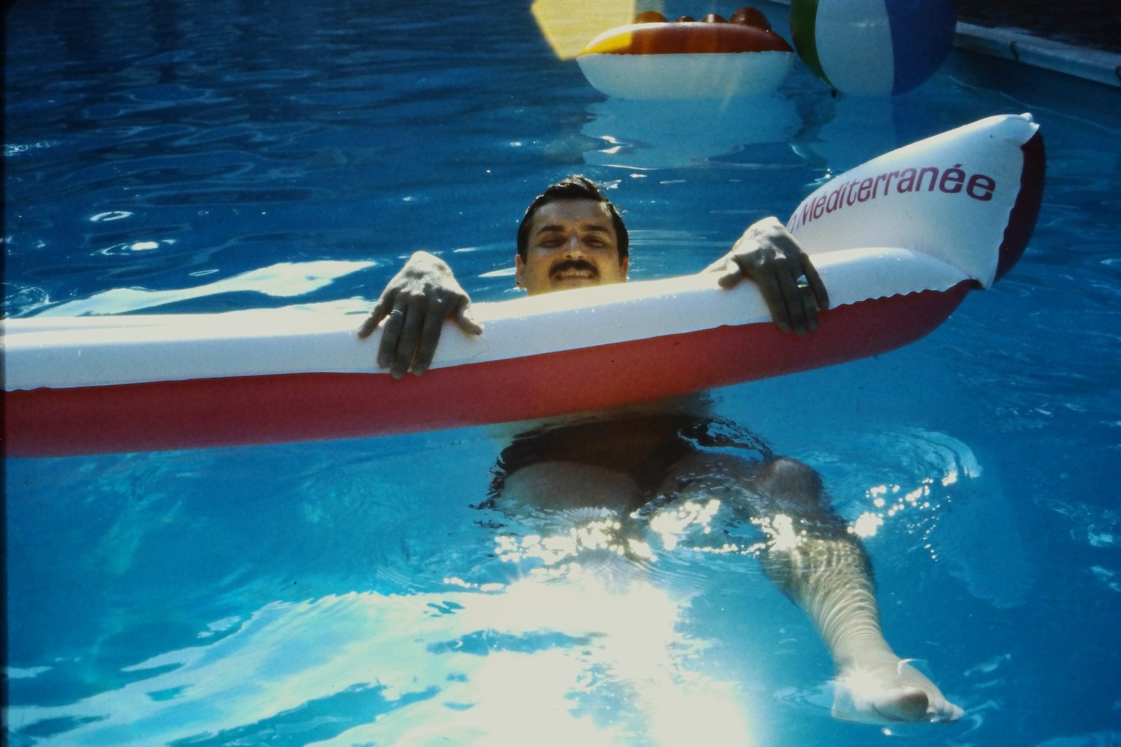 c1980\'s 35mm Slide, Man Inflatable Raft Swimming Pool Méditerranée Water c1980\'s 35mm Slide, Man Inflatable Raft Swimming Pool Méditerranée Water