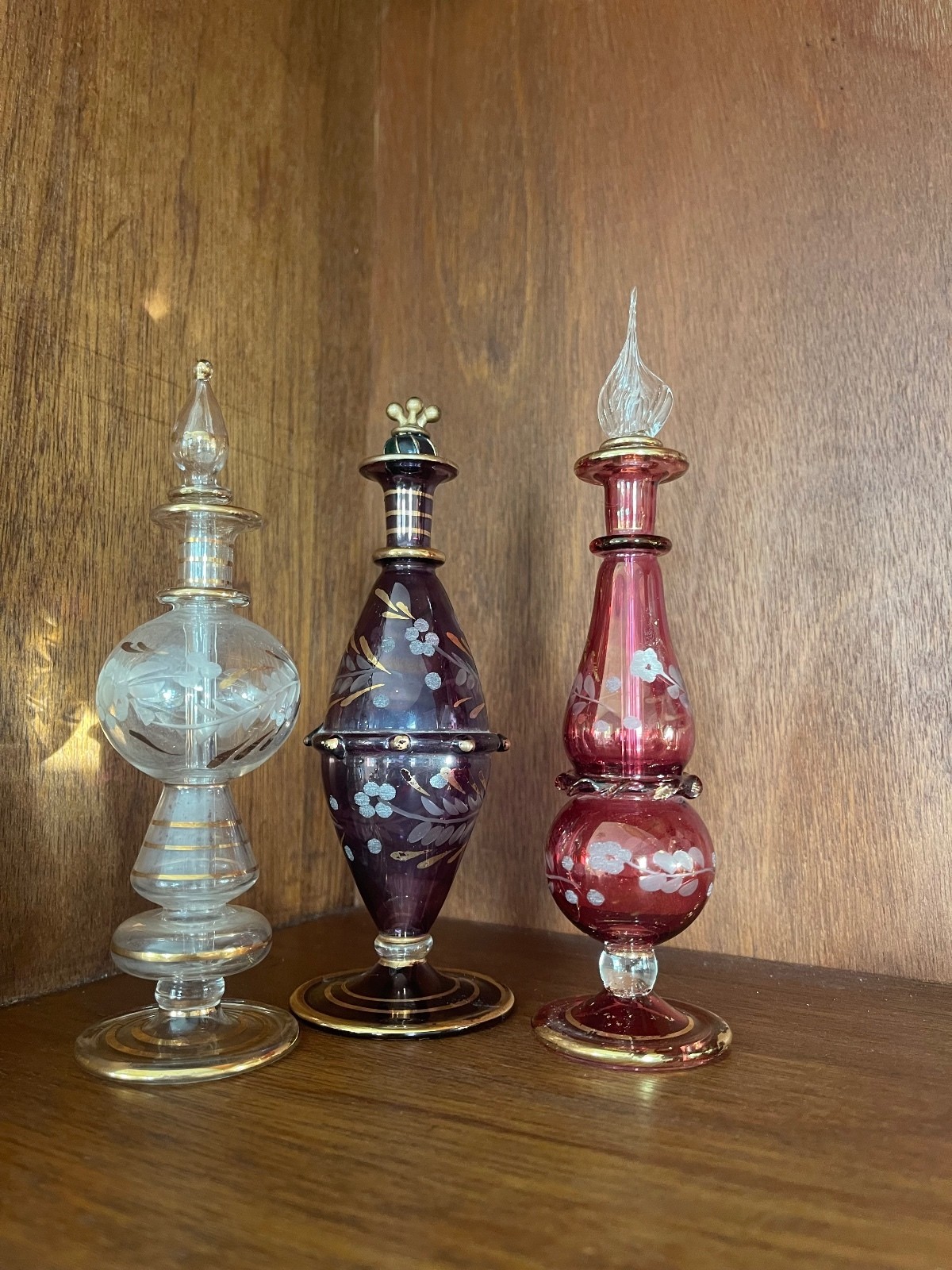 Set of 3 Antique Hand-Painted Art Glass Perfume Bottles Purple, Pink, Clear Gold Set of 3 Antique Hand-Painted Art Glass Perfume Bottles Purple, Pink, Clear Gold