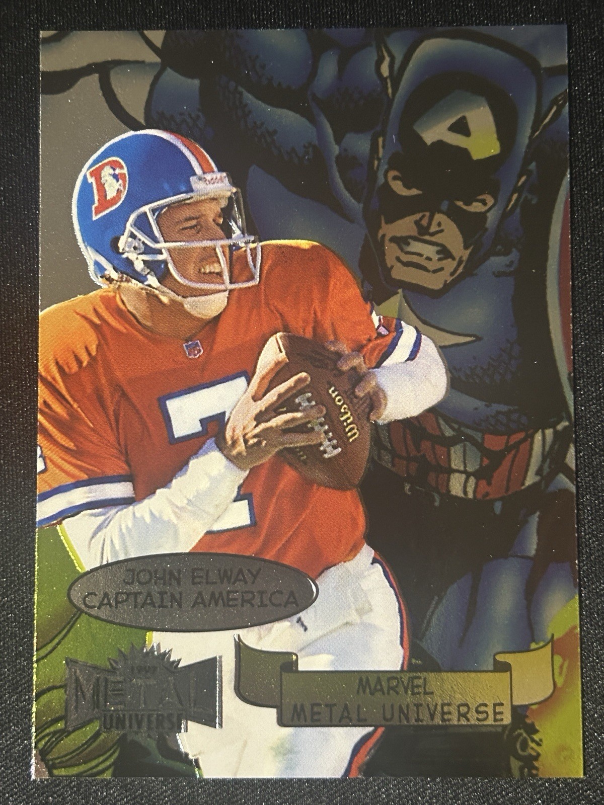 SkyBox 1997 Marvel Metal Universe Insert John Elway Captain America Card 8/20 SkyBox 1997 Marvel Metal Universe Insert John Elway Captain America Card 8/20