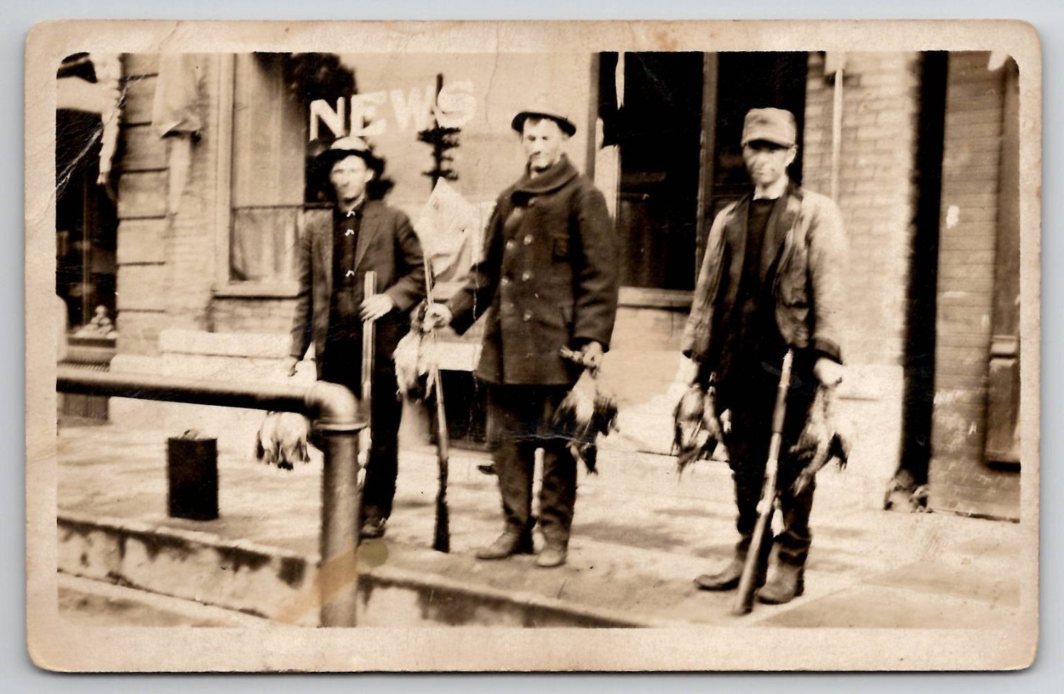 RPPC Three Hunters Shotguns Game Birds News Store Vintage Postcard 1910s RPPC Three Hunters Shotguns Game Birds News Store Vintage Postcard 1910s