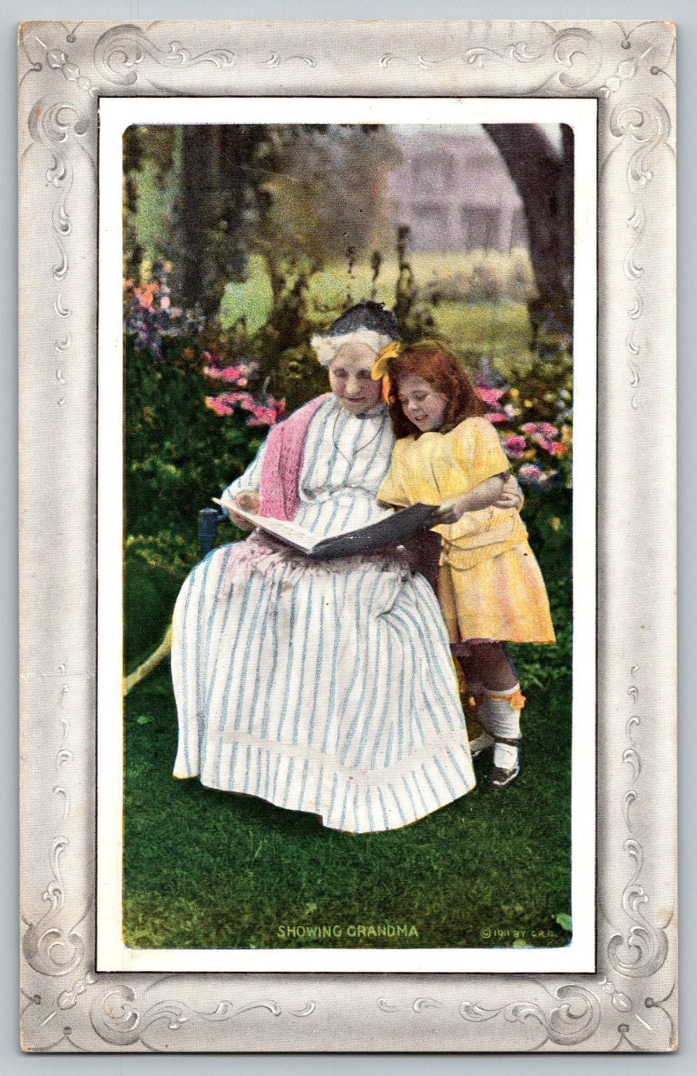 Vintage 1911 Embossed Postcard Showing Grandma & Child Reading Vintage 1911 Embossed Postcard Showing Grandma & Child Reading