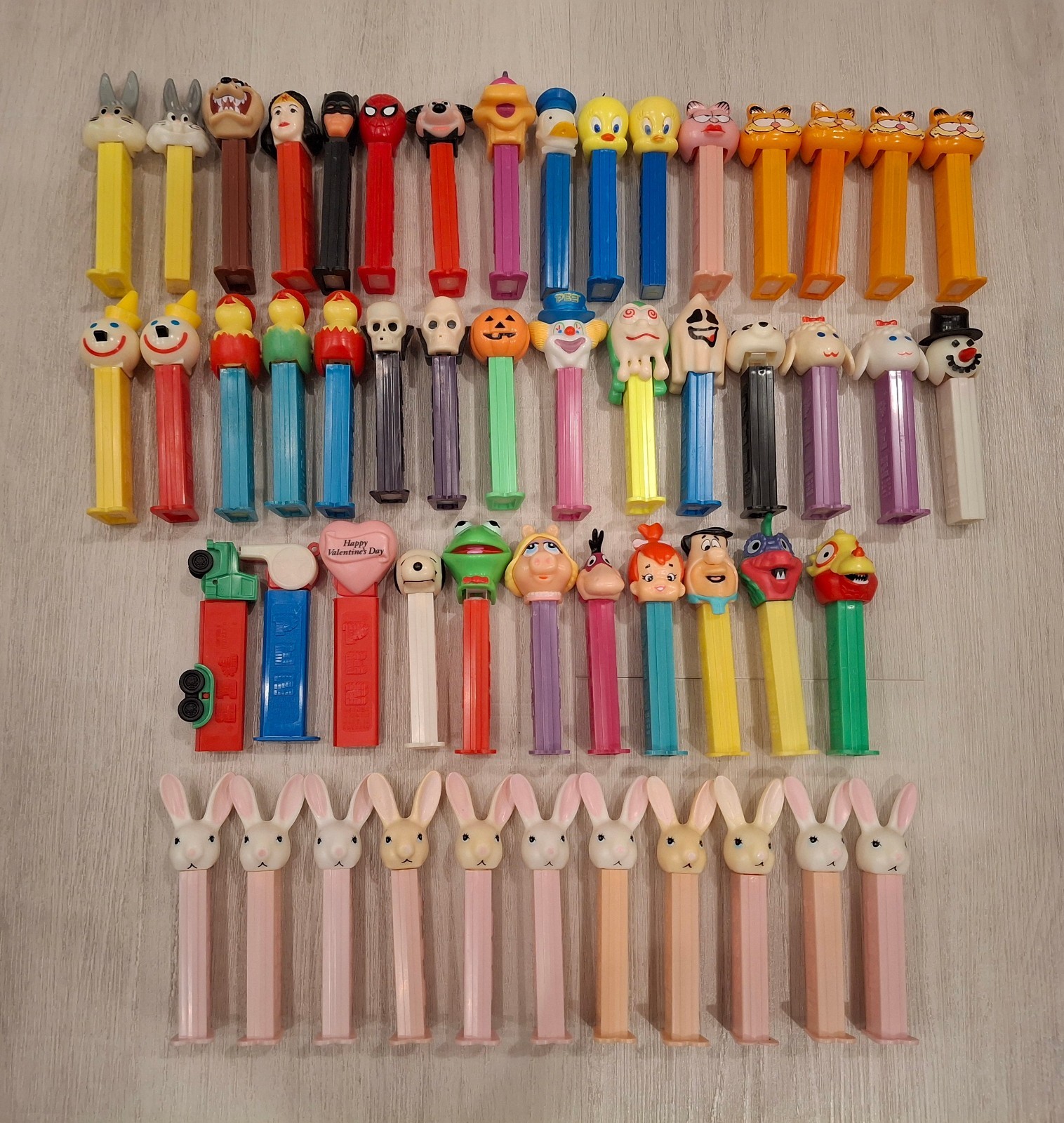 LOT OF (53) VTG PEZ DISPENSERS: Batman, Spiderman, Wonderwoman, Garfield, Tweety LOT OF (53) VTG PEZ DISPENSERS: Batman, Spiderman, Wonderwoman, Garfield, Tweety