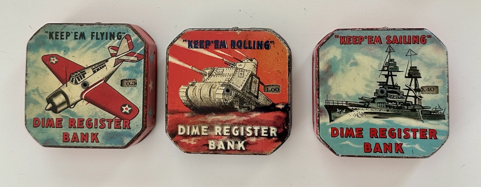 Keep \'Em Rolling, Keep \'Em Flying, Keep \'Em Sailing Tin Dime Banks Keep \'Em Rolling, Keep \'Em Flying, Keep \'Em Sailing Tin Dime Banks