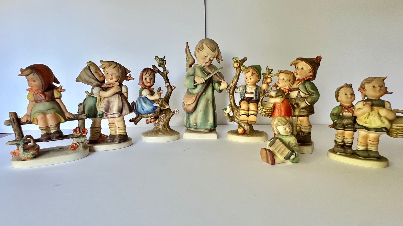 Vintage Goebel M.I. HUmmel Figurines Lot of 8 Full Bee Germany Apple Tree
