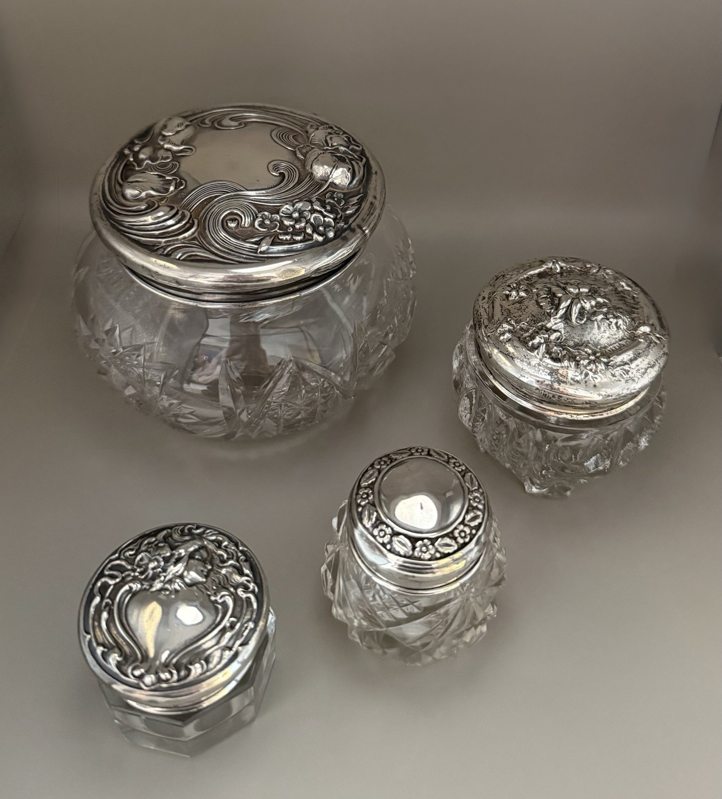 Collection of Four Antique Vanity Jars Sterling Silver Lids. Art Nouveau Design Collection of Four Antique Vanity Jars Sterling Silver Lids. Art Nouveau Design