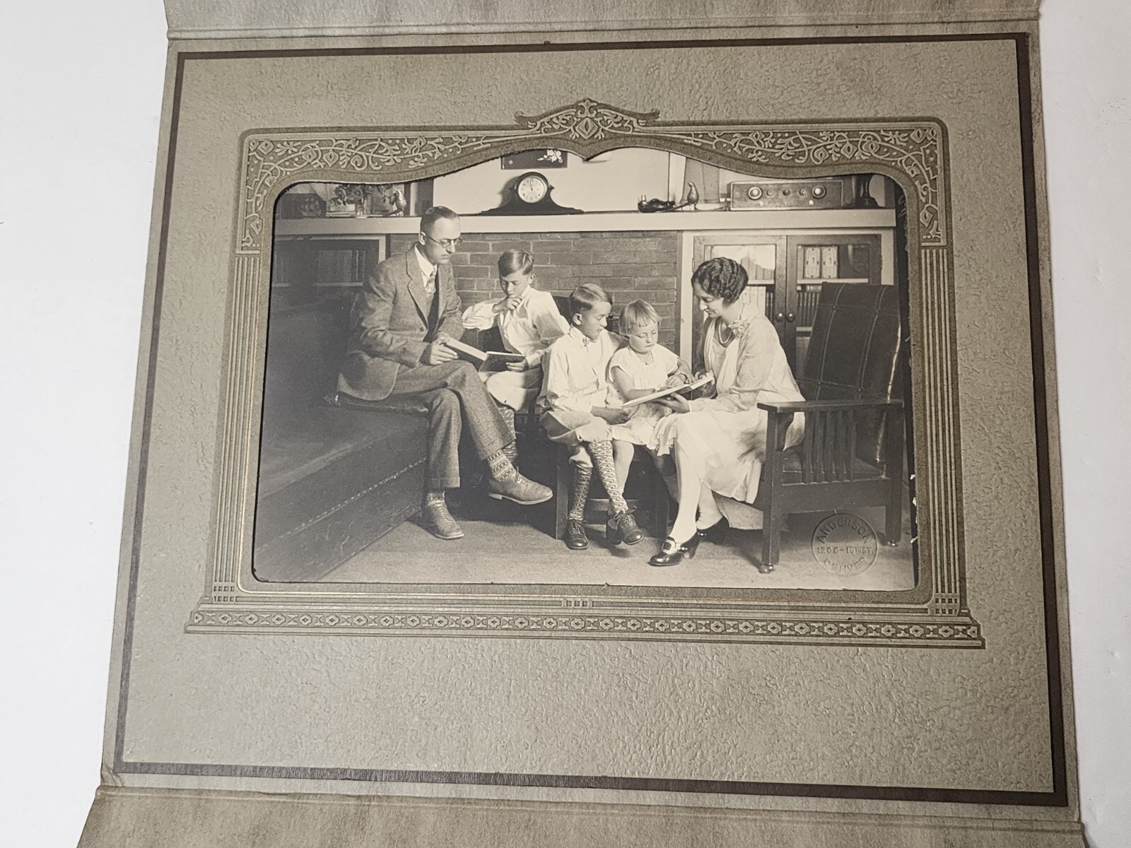VINTAGE FAMILY PHOTO OF PARENTS READING WITH OR TEACHING THEIR CHILDREN MATTED