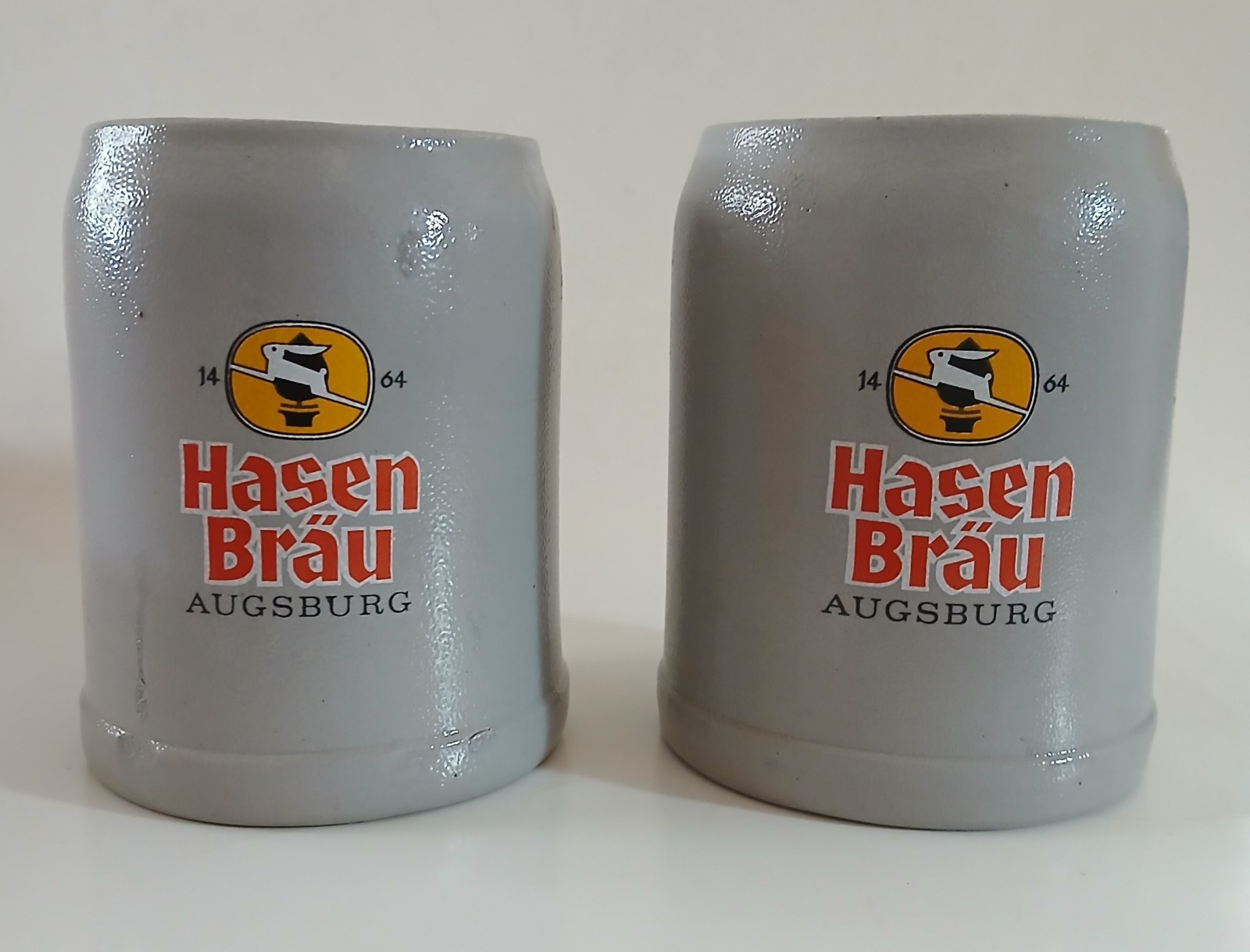 Vintage Hasen Brau Augsburg Germany 0.5L Stoneware Beer Steins Mugs Pair Set