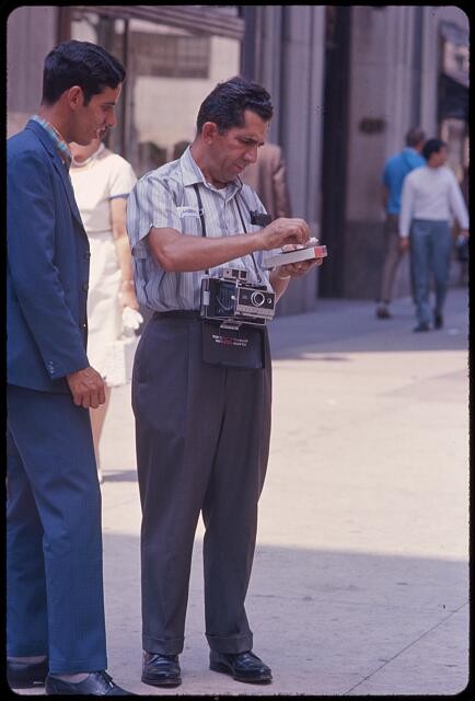 Photo:New York City 1970s July 4 tourists camera street scene