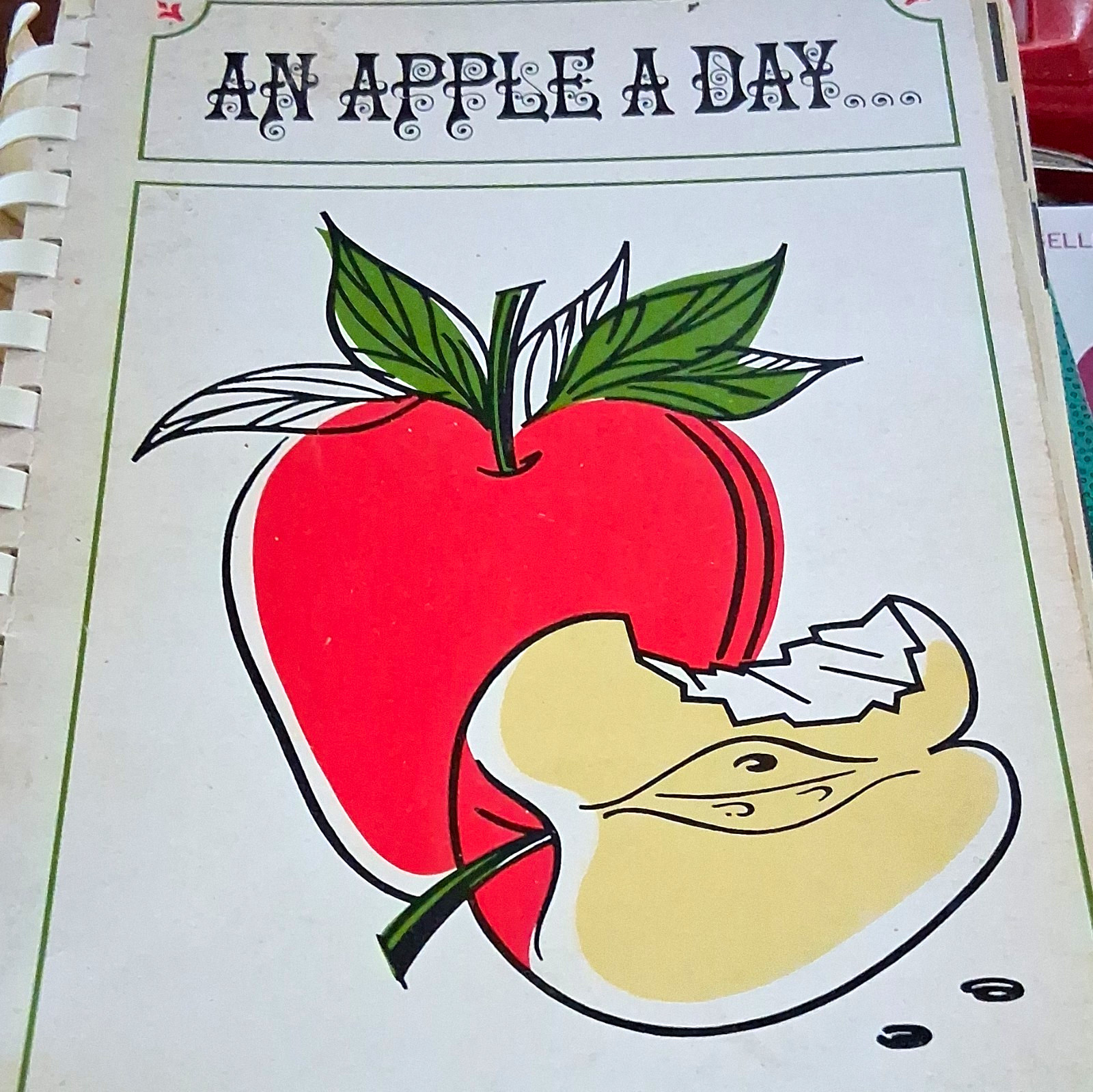 An Apple a Day... Vegetarian Cookery by Doctors' Wives Spiral/Comb Bound Booklet An Apple a Day... Vegetarian Cookery by Doctors' Wives Spiral/Comb Bound Booklet