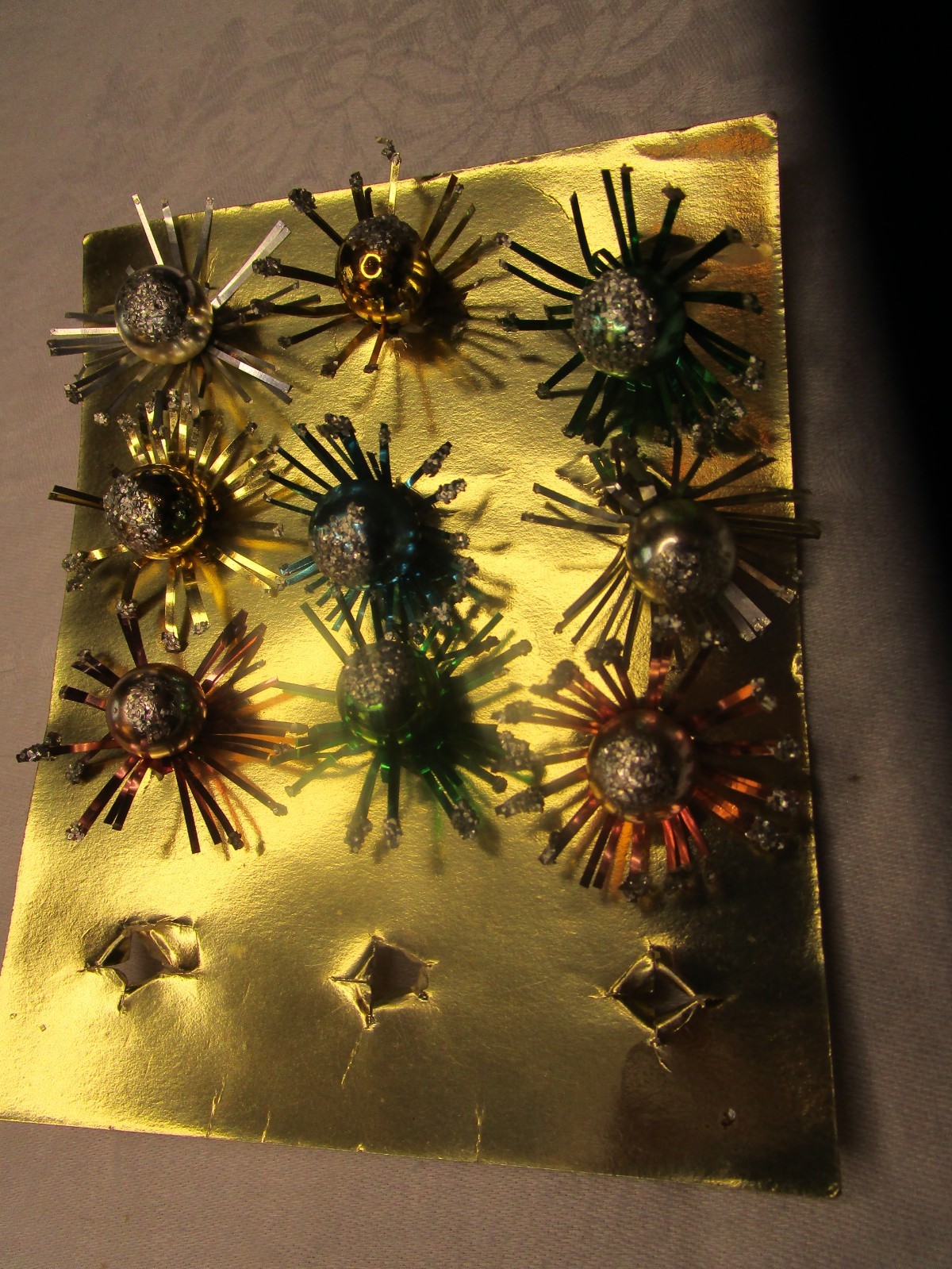 Lot of 9 Vintage Mercury Glass Tinsel Christmas Package Ties Atomic Starburst