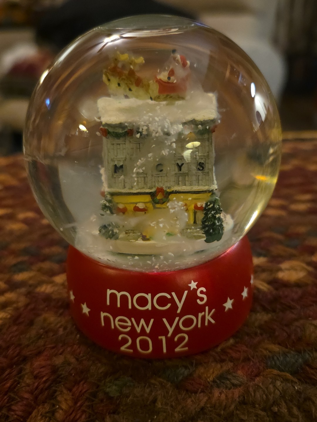 Macy's New York 2012 Snowglobe Macys Building Santa In Sleigh On Top. Red Clear Macy's New York 2012 Snowglobe Macys Building Santa In Sleigh On Top. Red Clear