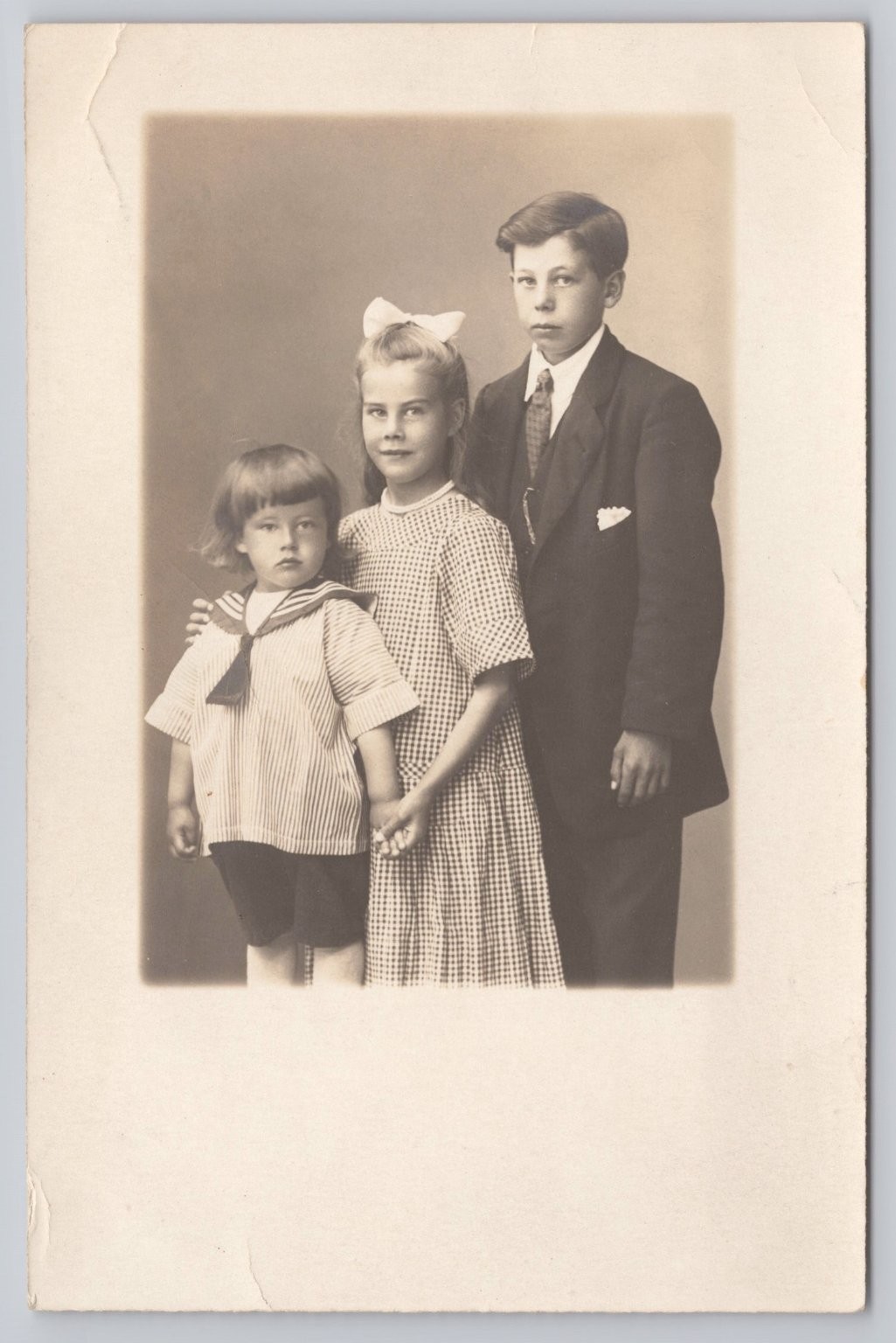 RPPC Three Children Siblings Studio Portrait Photo Postcard c1910s LEONAR RPPC Three Children Siblings Studio Portrait Photo Postcard c1910s LEONAR