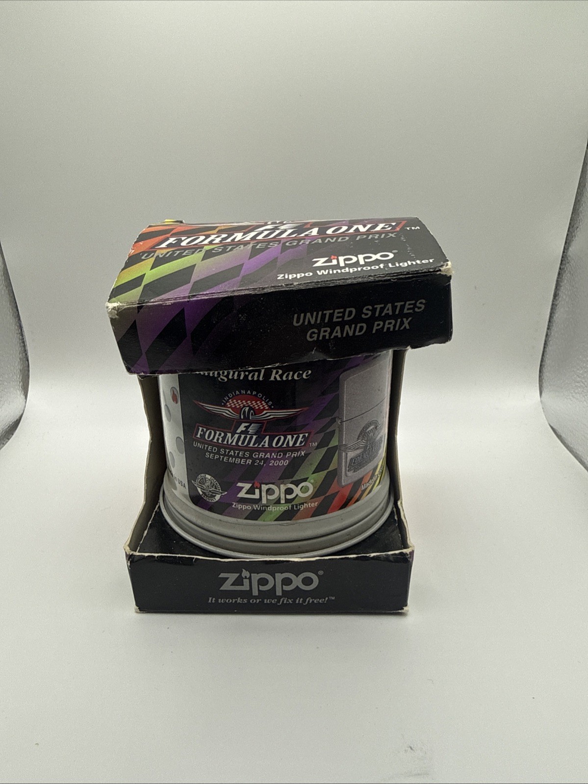 Zippo F1 Formula One US Grand Prix Sep 24 2000 Oil Lighter with Tin Case Unused