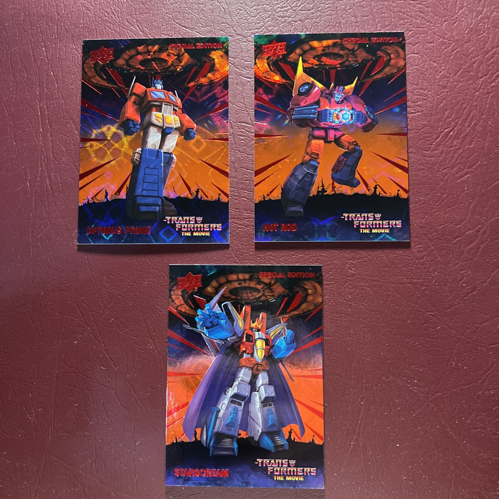 2026 Upper Deck Transformers 40th RARE Red Foil Holo #1 Optimus Prime 0267/1986 2026 Upper Deck Transformers 40th RARE Red Foil Holo #1 Optimus Prime 0267/1986