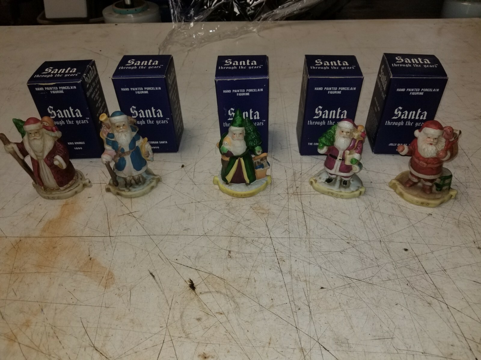 Santa Through The Years Hand Painted Porcelain Figurine Set of 5