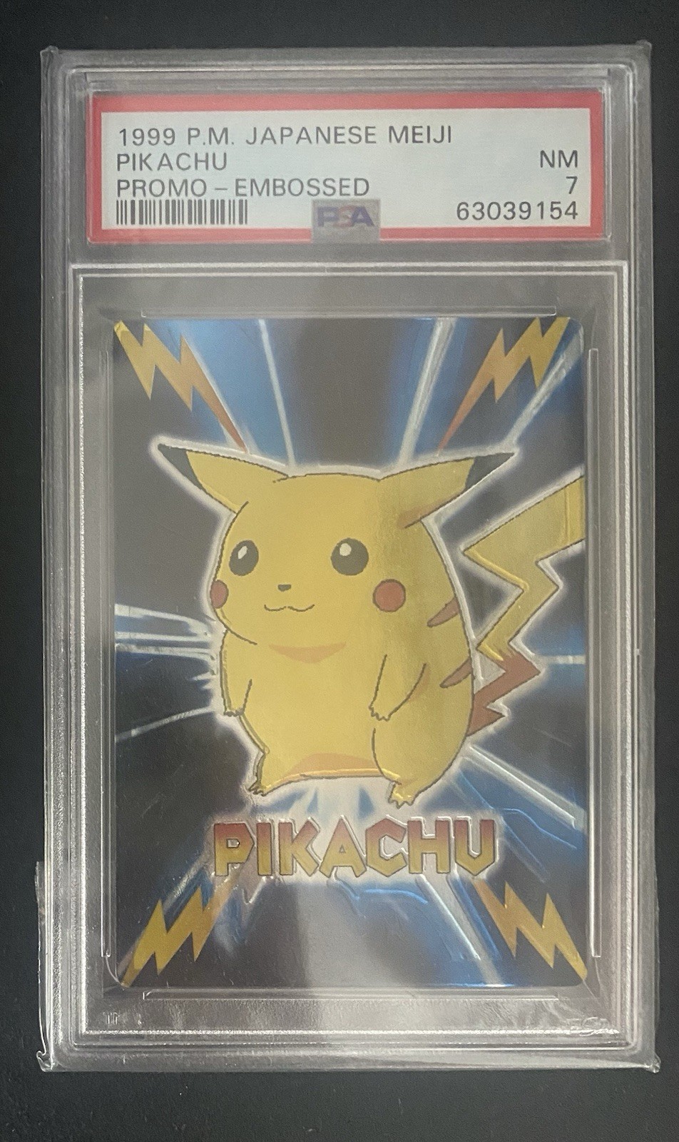 Japanese Pokemon Card - Pikachu Embossed Meiji Promo 1999 PSA 7 POP 68 Japanese Pokemon Card - Pikachu Embossed Meiji Promo 1999 PSA 7 POP 68