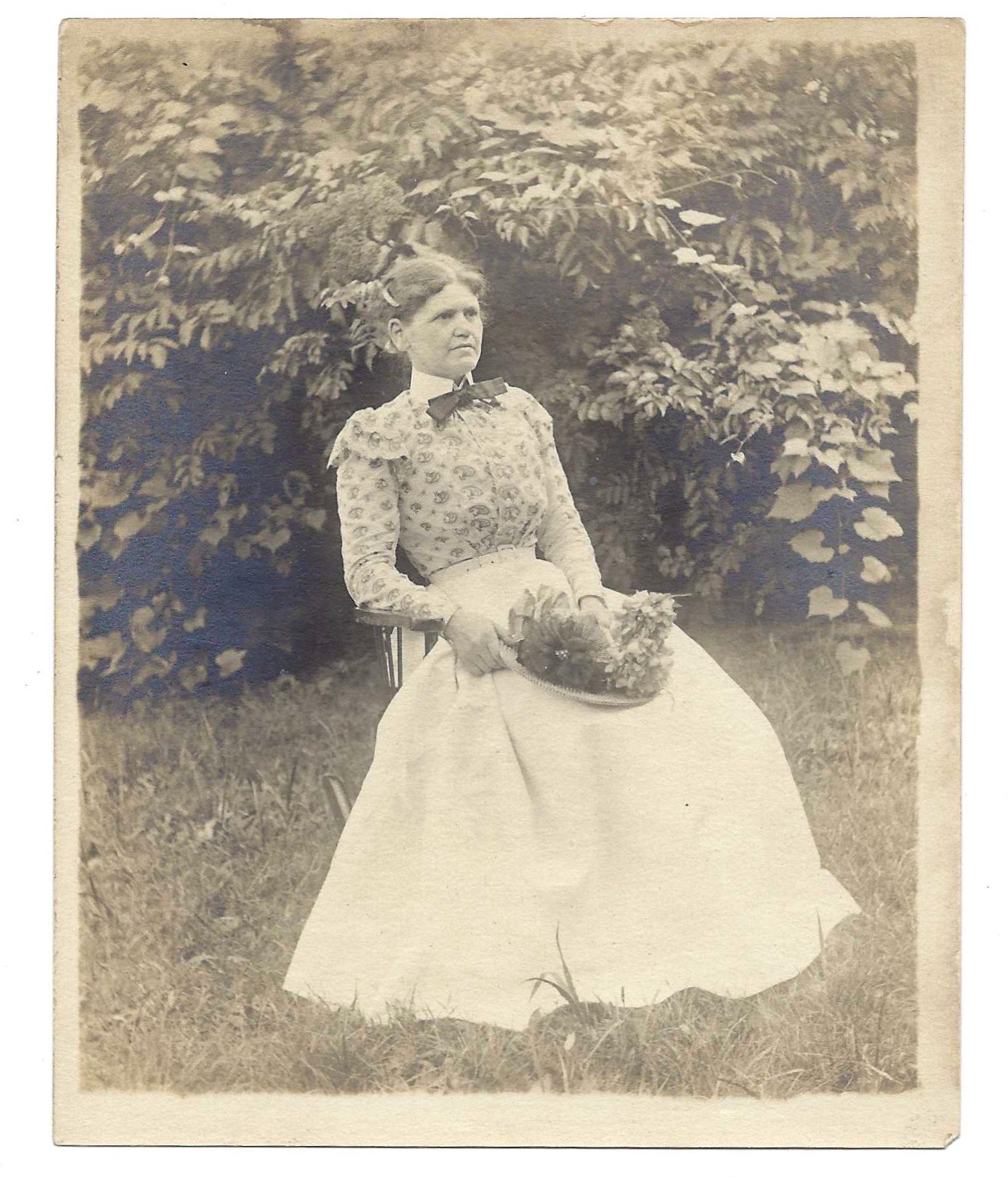 Vintage Vernacular Snapshot Victorian Lady with Flower Hat Poses in Yard
