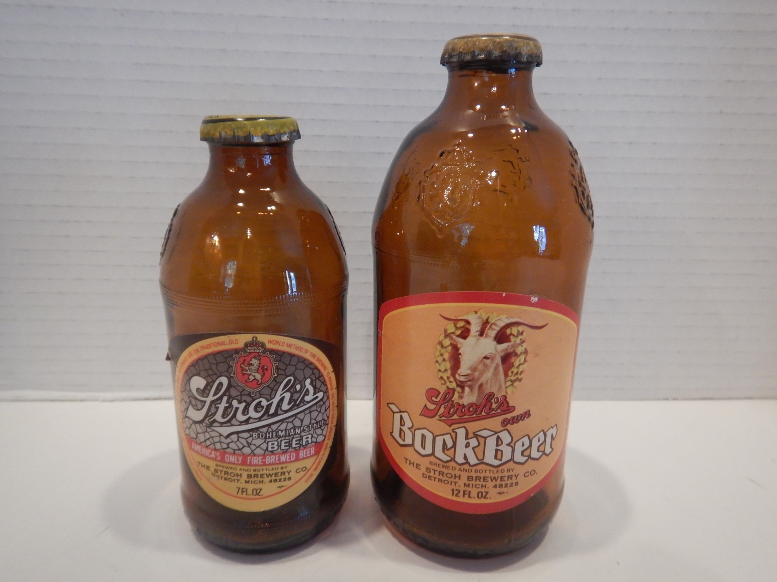 STROH'S Beer Bottles Short Style Regular 7 Ounce and Bock 12 Ounce w/ Caps EMPTY STROH'S Beer Bottles Short Style Regular 7 Ounce and Bock 12 Ounce w/ Caps EMPTY